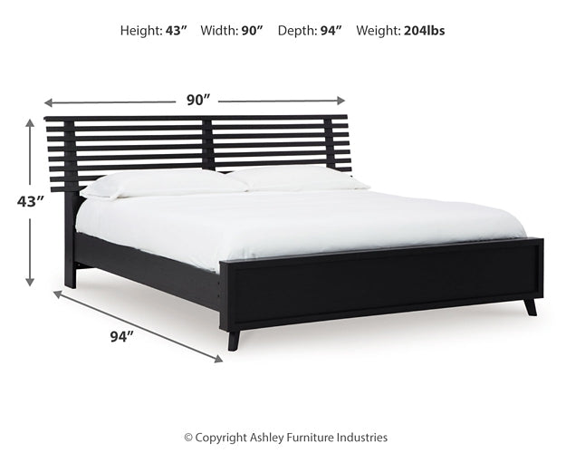 Danziar King Panel Bed with Mirrored Dresser